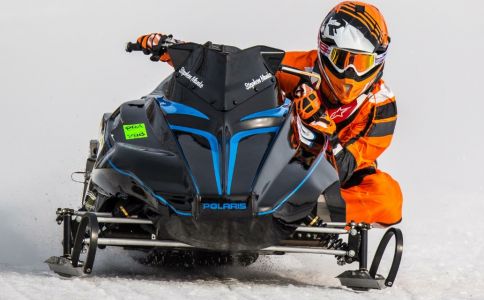 Stephen Manke racing a snowmobile